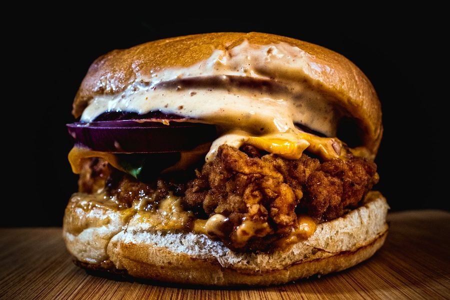 Crispy chicken burger with lettuce and pickles