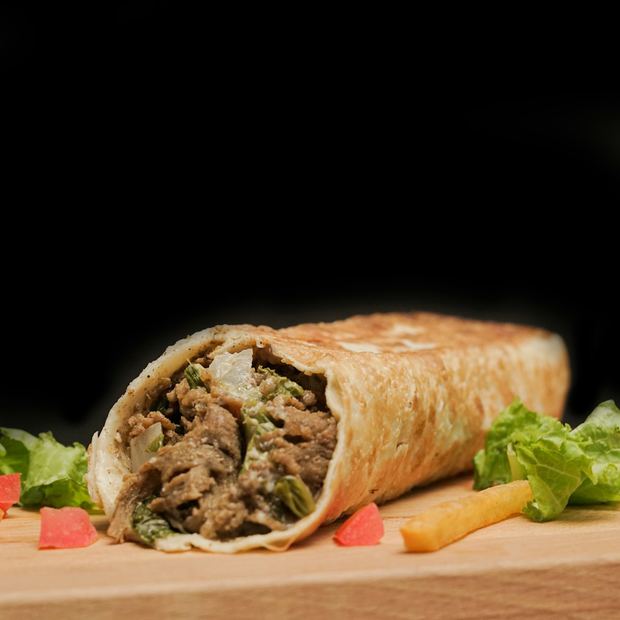A rolled wrap sliced open